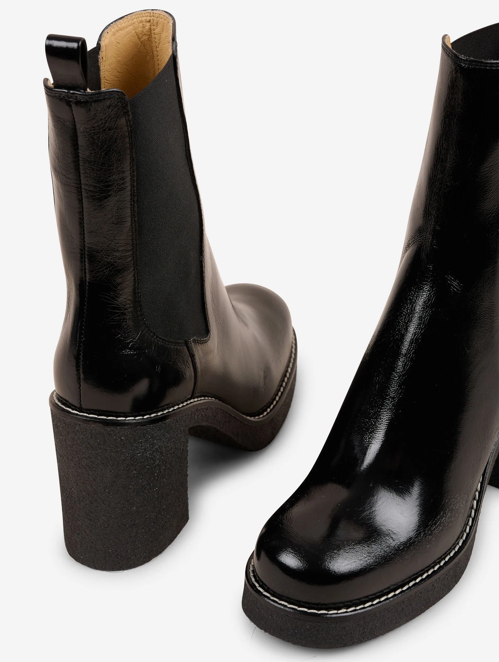 Elasticated black patent leather ankle boots